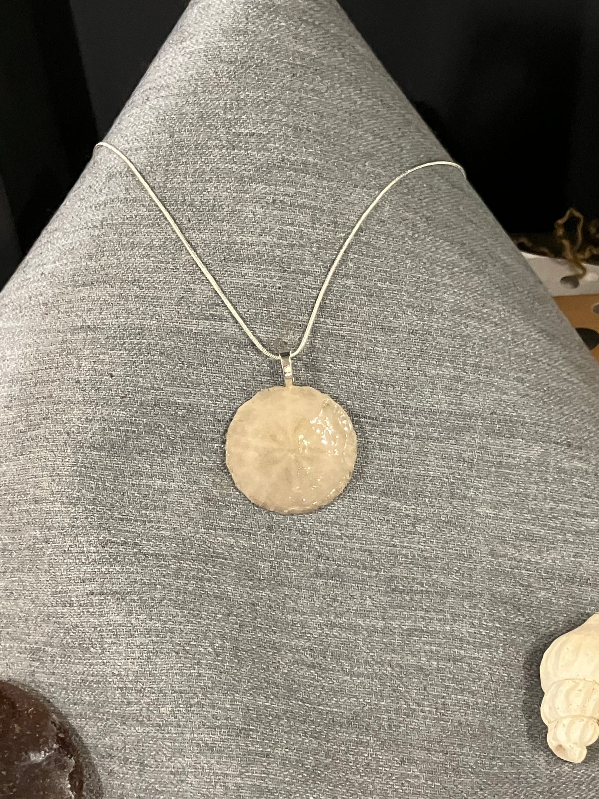 Sand dollar necklace silver cord by Tonya Arnold