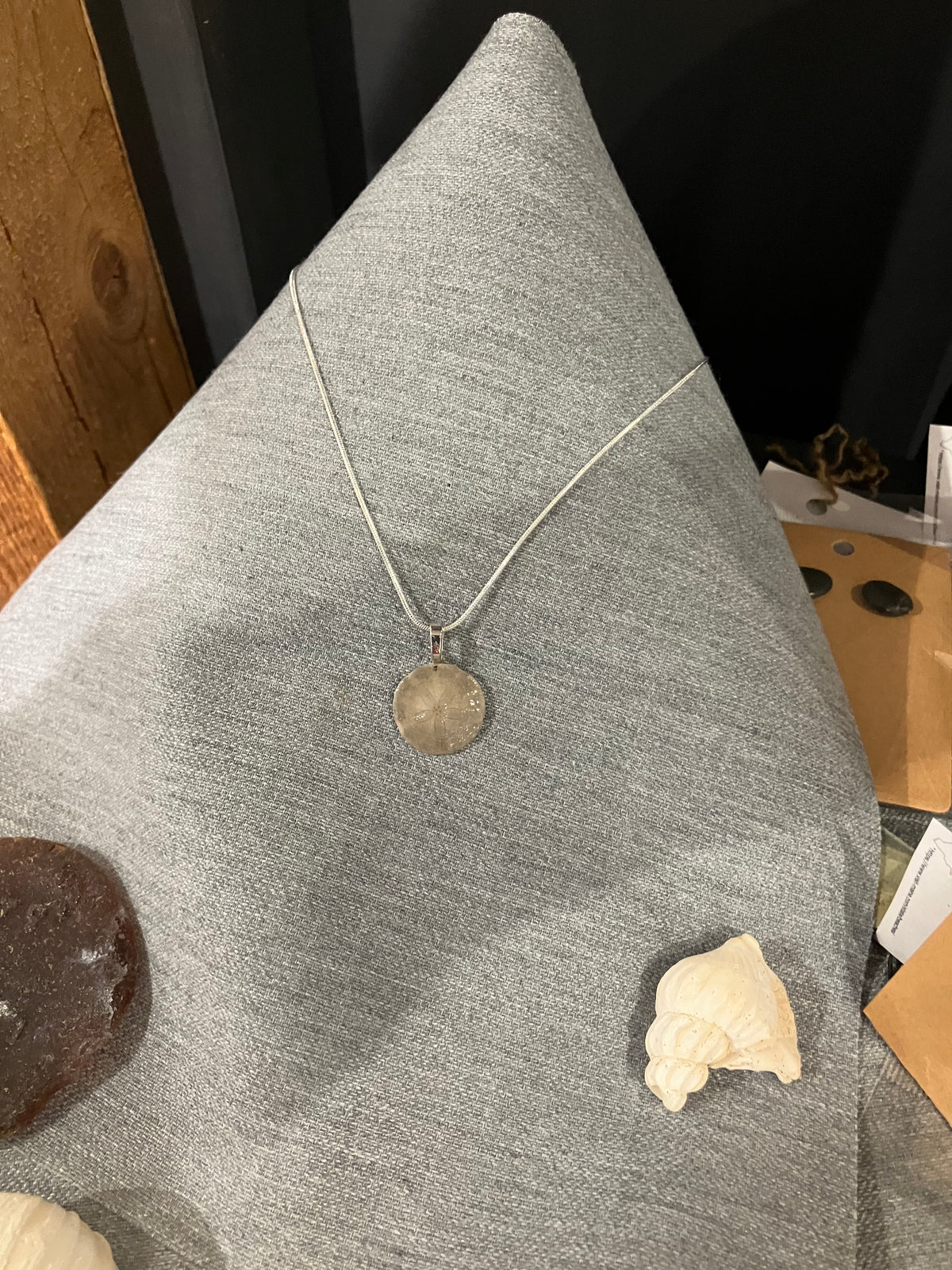 Sand dollar necklace on silver cord-tiny tan by Tonya Arnold