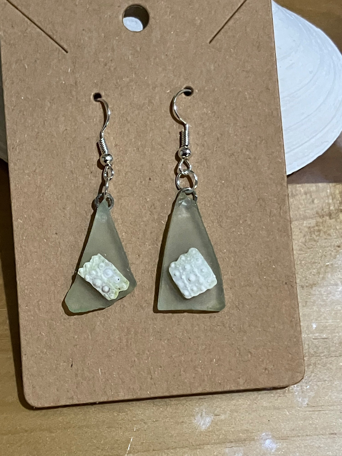 Earrings pale green urchin pieces by Tonya Arnold