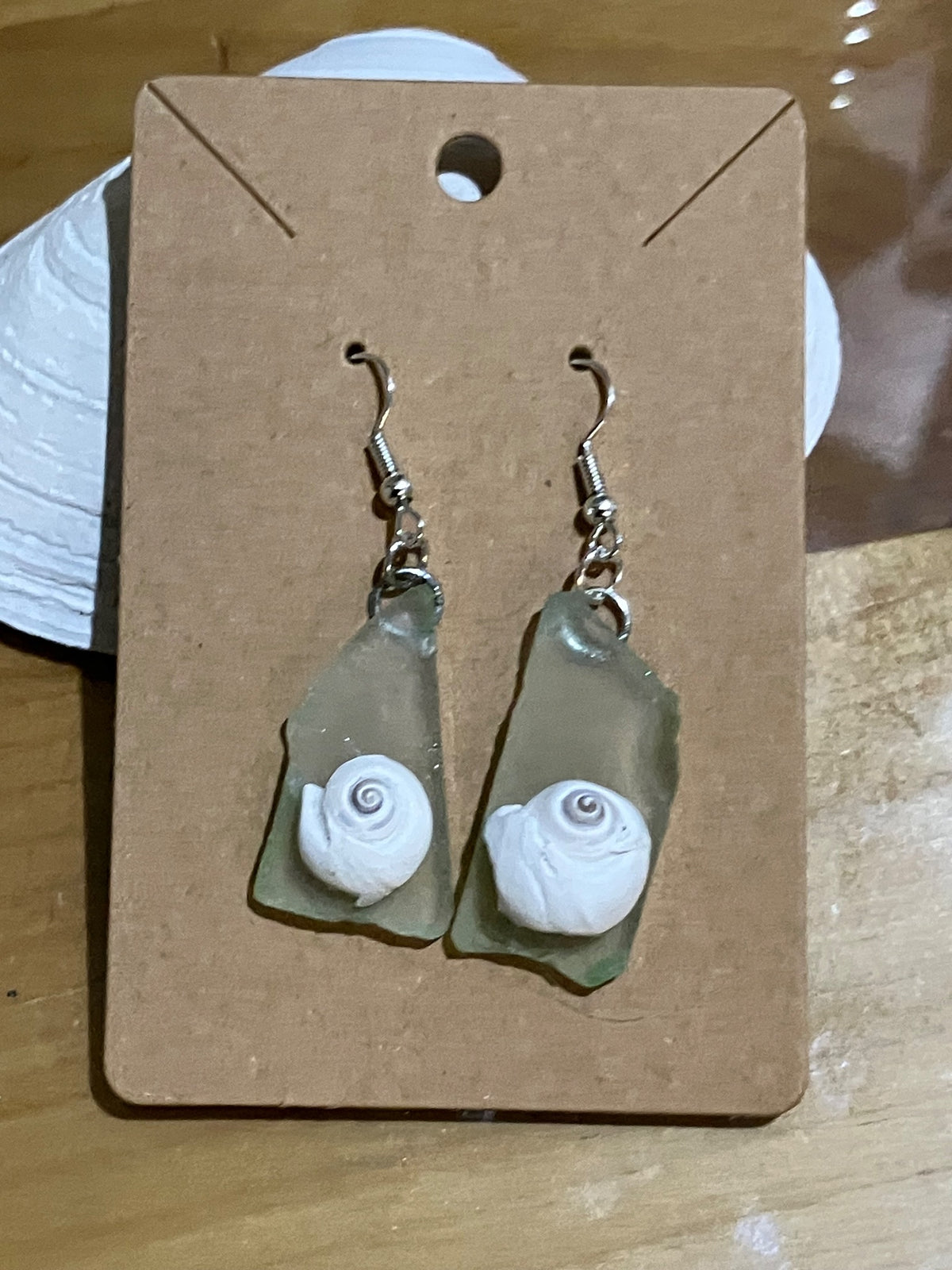 Earrings - pale green sea glass moon shell by Tonya Arnold